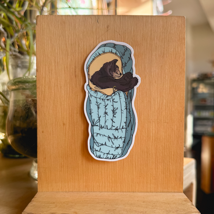 blue sleeping bag bear sticker