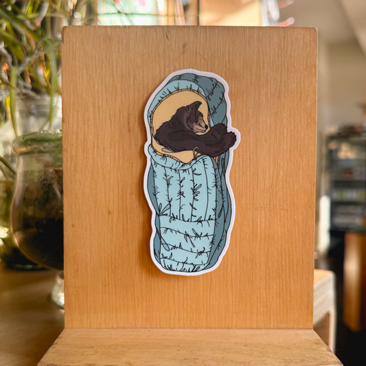 blue sleeping bag bear sticker