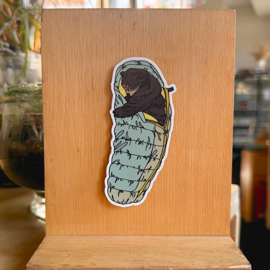 green sleeping bag bear sticker
